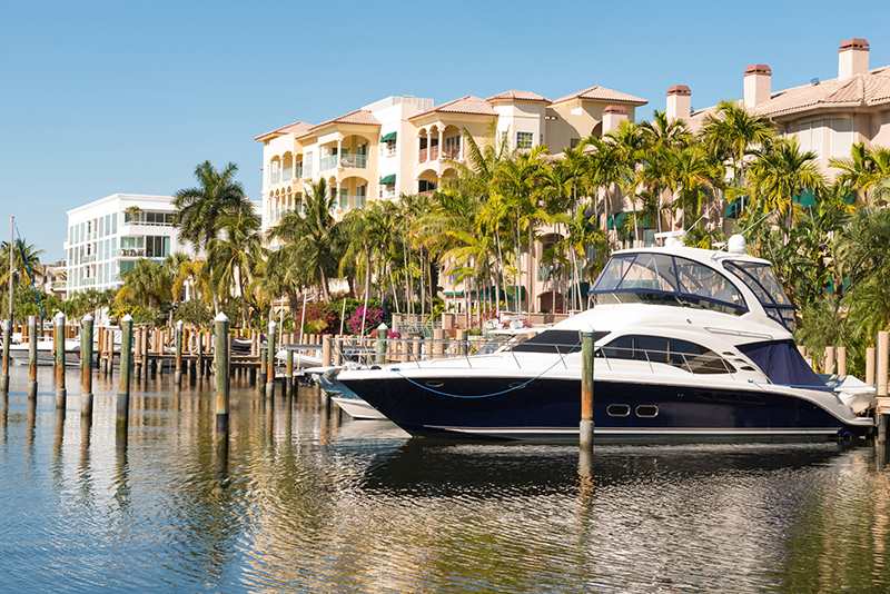 Luxury Boat Docked by Residential Buildings in Las Olas Fort Lauderdale Florida