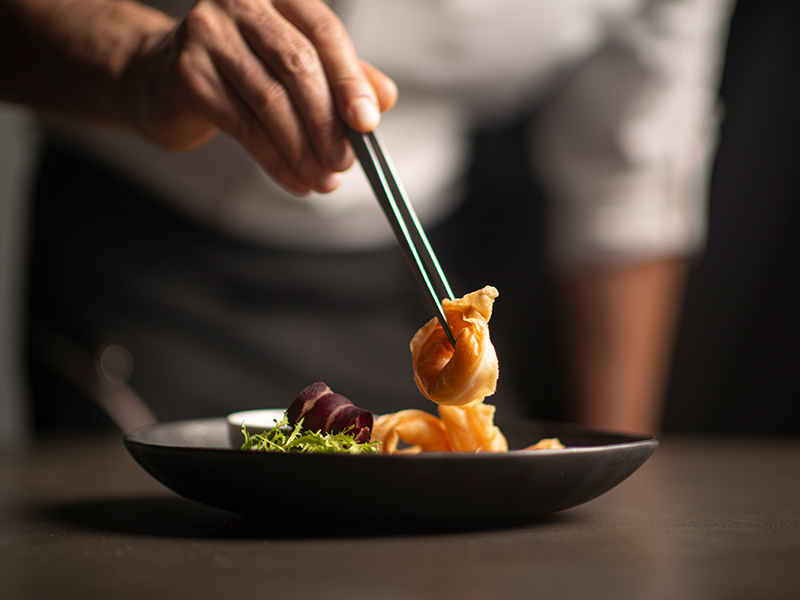 chef plating in one of Fort Lauderdale top restaurants